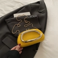 Bright yellow pillow bag with a C-shaped metal handle and gold snake chain strap - Yellow
