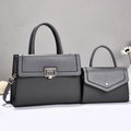 Zweiteiliges dunkelgraues Handtaschen-Set aus geflochtenem Leder mit verstellbarem Gurt - Grau