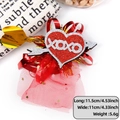 Valentine's red glitter heart hair clip with XOXO text and mesh tulle decoration - Arrow Heart XOXO Style