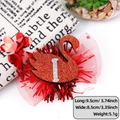 Sparkly red swan hair clip with glitter and mesh detail for holiday hair styling - Red Swan Style