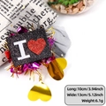 Sparkly black heart badge with pink ribbon and crown design for party styling - Black Plaque Style