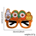 Detailed view of Halloween felt glasses frame featuring pumpkin ghost and size dimensions - Eyeball Pumpkin