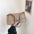 Minimalist apricot baguette shoulder bag with cylindrical handle and golden lock - Khaki