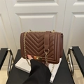 Deep brown quilted crossbody bag with gold chain strap and elegant metal lock closure - Brown