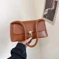Minimalist brown leather baguette shoulder bag with stylish ruched handle and gold buckle - Brown