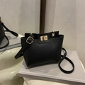 Minimalist black lychee pattern leather shoulder bag with gold hardware twist lock - Black