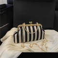 Retro doctor style crossbody bag with black and white vertical stripes and gold handle - Black