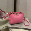 Pink lychee texture shoulder bag with golden turn-lock and adjustable leather strap - Pink