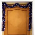Patriotic Independence Day tinsel garland with red blue and silver stars on wood door - Colorful Stripes / Red Blue Silver