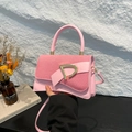 Elegant pink contrast handbag with knit texture, gold D-buckle and top handle design - Pink