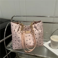 Borsa tote trapuntata rosa con stampe di fiocchi neri e tracolla a catena dorata - Rosa