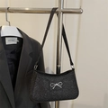 Elegant black sequin shoulder bag featuring a silver bow decoration and a minimalist design - Black