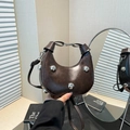 Dark brown crescent hobo bag with large silver metallic studs and wide knotted shoulder strap - Brown