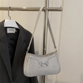 Sparkly silver sequin shoulder bag with metal bow detail for elegant commute - Silver