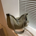 Olive green nylon crescent tote bag with adjustable strap and small round coin purse - Green