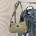 Sage green nylon shoulder bag with geometric zipper detail and adjustable strap - Green