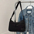 Minimalist black nylon crossbody bag with dual zip pockets and adjustable strap - Black