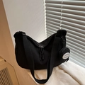Black nylon crescent crossbody bag with adjustable wide strap and small round coin pouch - Black