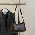 Brown crocodile pattern faux leather handbag with silver bow detail and slim shoulder strap - Brown