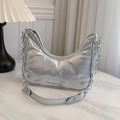 Silver metallic crescent dumpling bag with fashion typography and chain strap detail - Silver