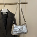 Silver bow shoulder bag with crocodile pattern and stylish underarm carry design - Silver