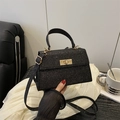 Elegante borsa Kelly in paillettes nere con chiusura dorata e tracolla rimovibile - Nero