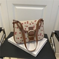 Borsa a spalla in tela crema con stampa a ciliegie e rifiniture in pelle marrone - Marrone