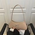 Chic beige underarm baguette bag with silver bow accent and adjustable shoulder strap - Khaki