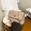 Pale pink crocodile pattern crossbody chain bag with silver rectangular turn-lock - Pink