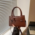 Retro dark brown crossbody bag with bow detail and matte leather finish for women - Brown