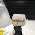 Women's woven saddle bag with floral embroidery and gold horseshoe buckle - White