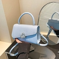 Light blue crossbody bag with woven texture flap and silver heart-shaped lock - Blue