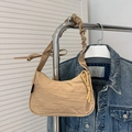Minimalist beige ruffled shoulder bag with pleated texture and adjustable strap - Khaki