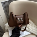 Chic dark brown faux leather bow shoulder bag for women with silver metal bow clasp decor - Brown