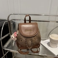 Brown vintage backpack with patchwork canvas, chain detail, and plush alpaca charm - With Ornament / Brown