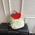 Watermelon styled student backpack made of nylon with red seed pattern and green base - Green