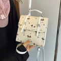Schicker Mini-Rucksack aus Segeltuch in Creme mit Dackeldruck und Schultergurt - Beige