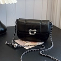 Classic black quilted leather crossbody bag with silver chain strap and metal buckle - Black