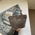Minimalist taupe nylon bucket handbag with woven handles and fashion print - Gray