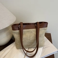 Women's trendy straw tote bag with brown leather trim and slim shoulder straps - Brown