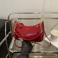 Red patent leather crescent underarm bag with gold chain and cherry charm detail - With Pendant / Red
