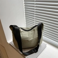 Waterproof olive green nylon crossbody bag with pleated texture and wide strap - Green