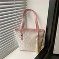 Pink and beige jacquard tote bag with traditional floral patterns and long tassel detail - Pink