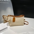 Borsa tote minimalista in tela crema con rifiniture in pelle marrone e tasche laterali moda - Beige
