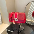 Red sequin and leather flap shoulder bag with gold chain strap and buckle closure - Red