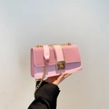 Pink patchwork crossbody bag for women with tweed texture and gold chain strap - Pink