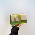 Chic green leather and beige canvas square crossbody bag with gold chain strap - Green