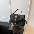Women's black snake-embossed shoulder bag with a gold-tone horse-bit buckle detail - Black