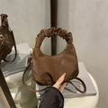 Brown ruched crescent handbag with textured synthetic leather and adjustable strap - Brown