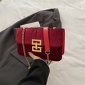 Elegant burgundy velvet crossbody bag with quilted patterns and gold metal clasp - Red